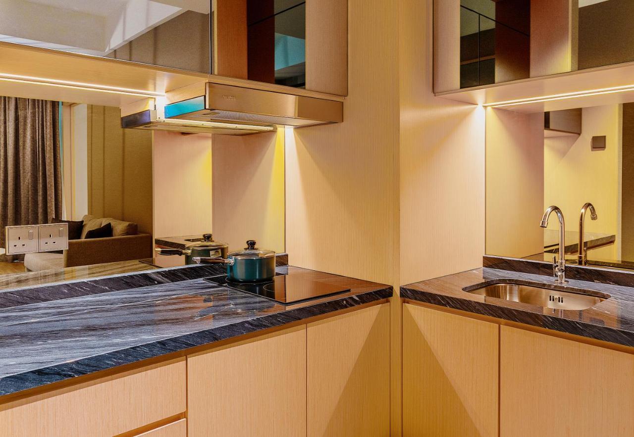 M World Hotel Formerly Known As Avante Hotel Petaling Jaya Bagian luar foto A kitchen with a granite countertop