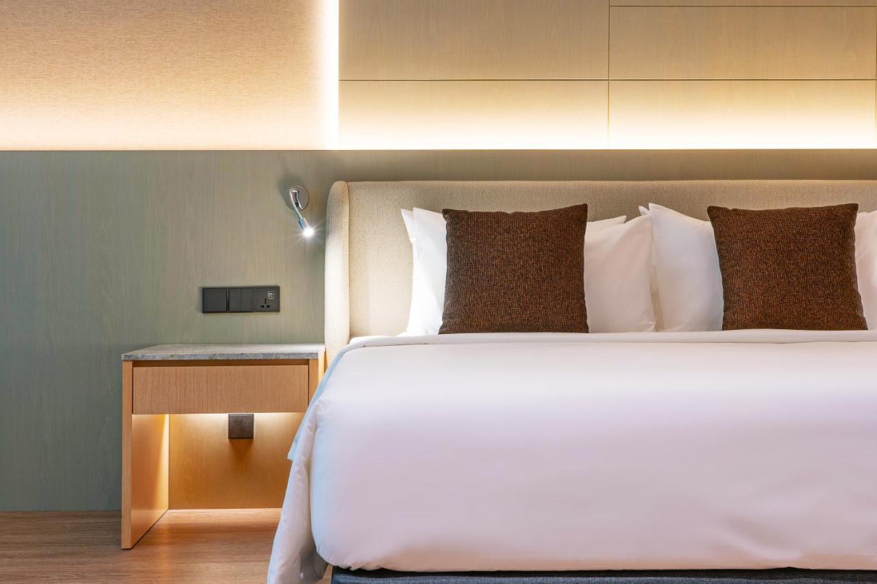 M World Hotel Formerly Known As Avante Hotel Petaling Jaya Bagian luar foto A bed in a hotel room